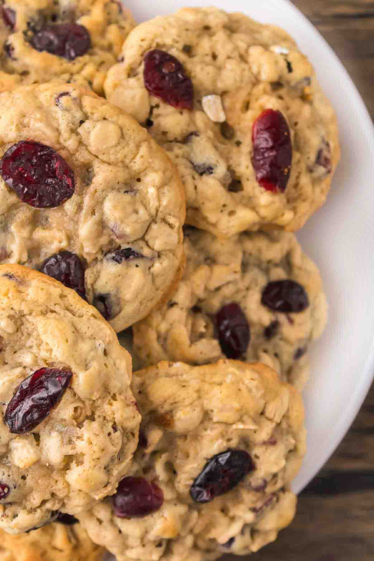 cranberry oatmeal cookies on a white plate.