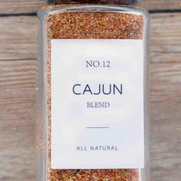 Cajun seasoning in a jar with white label,.