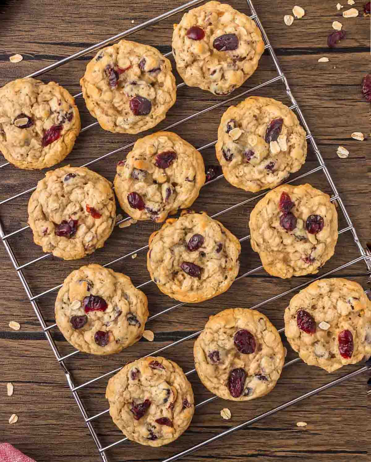 Cranberry oatmeal cookies on a wire rack.