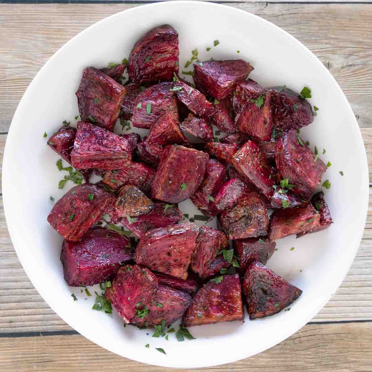 oven roasted beets in a white bowl.