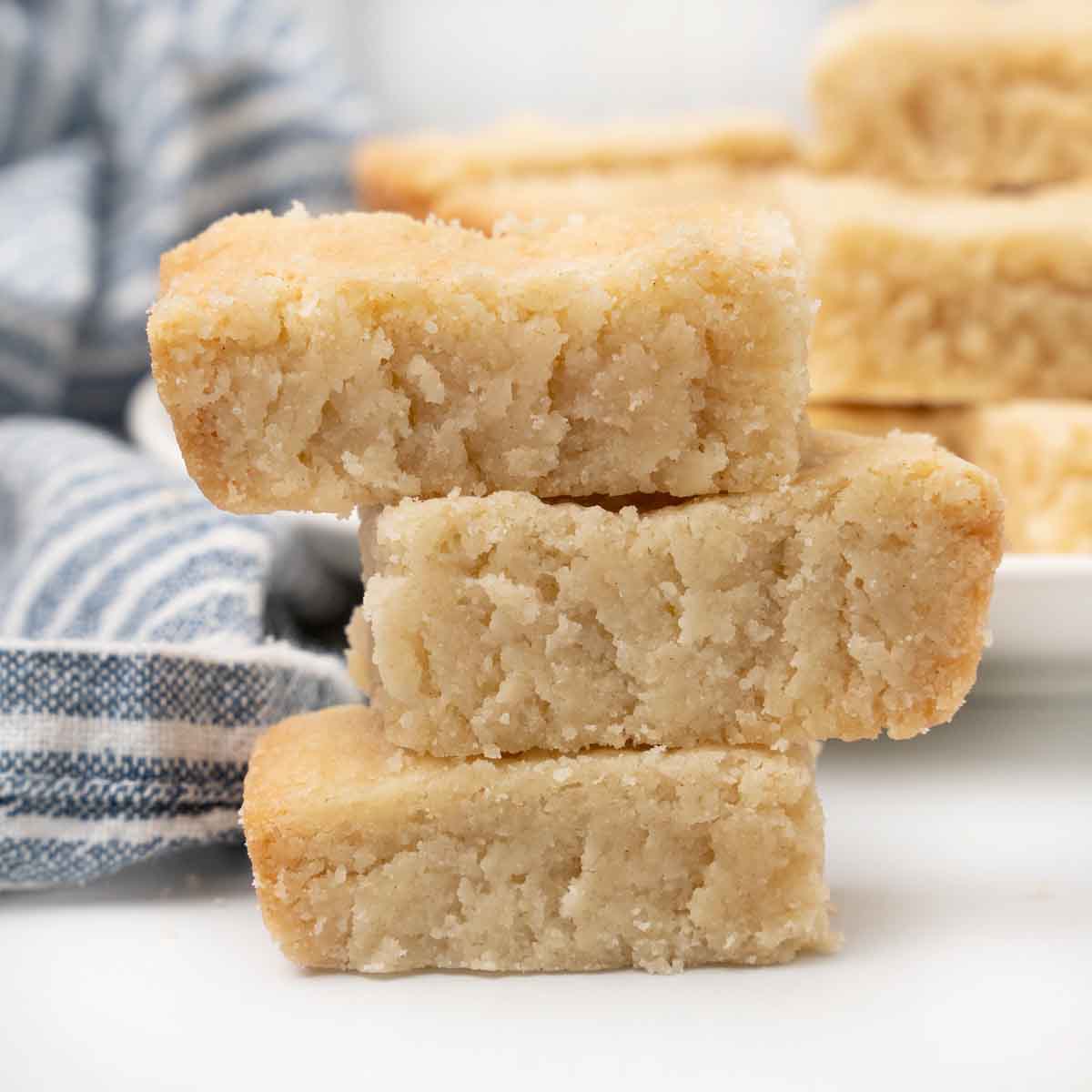 close up of three scottish shortbread stacked on the counter.