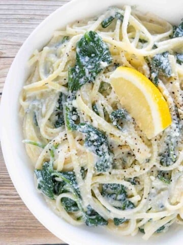 Lemon ricotta pasta in a white bowl.