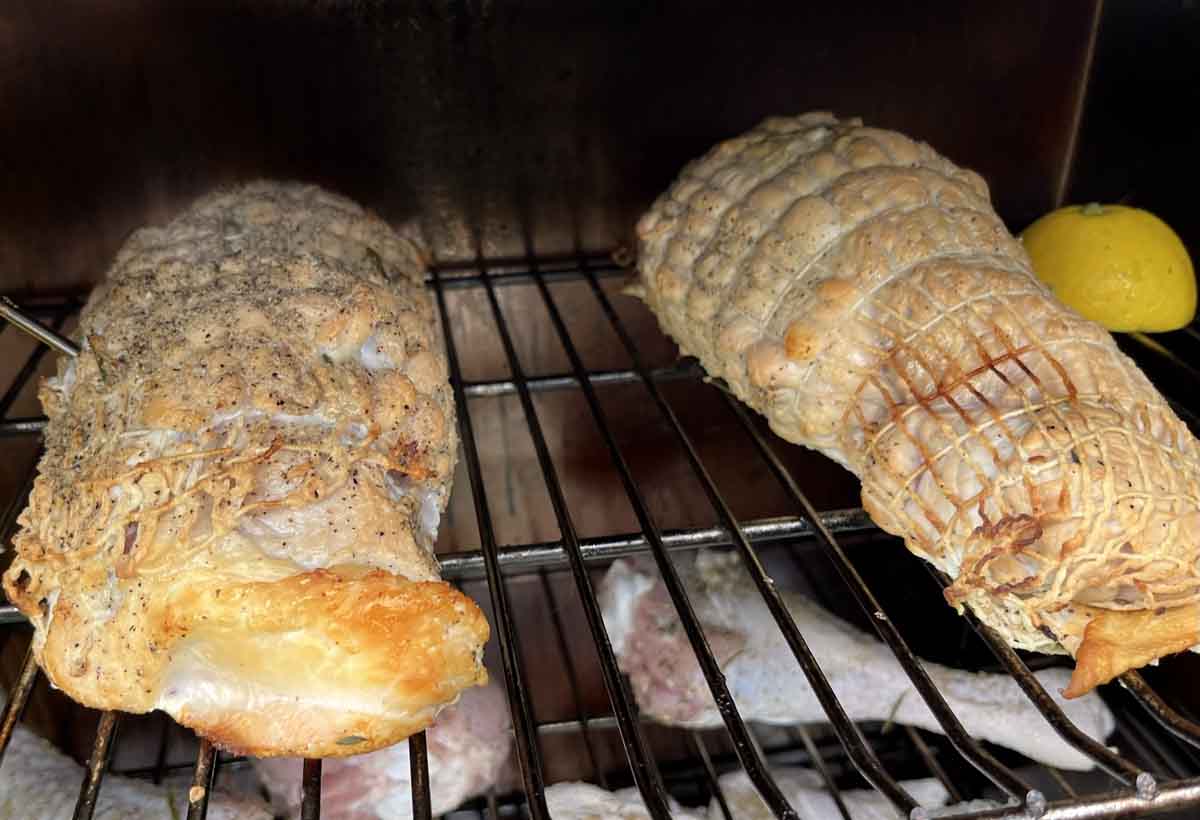 Roasts on rack in smoker.