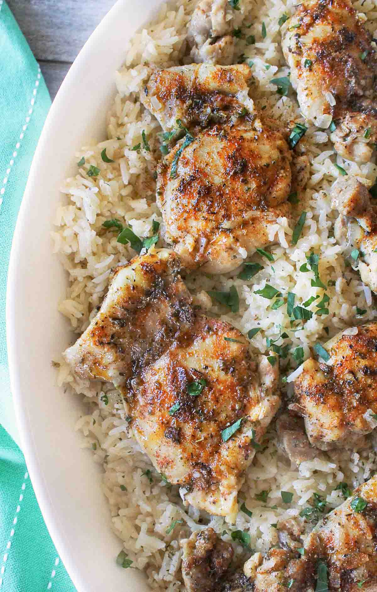 Chicken and Rice in a white serving platter.