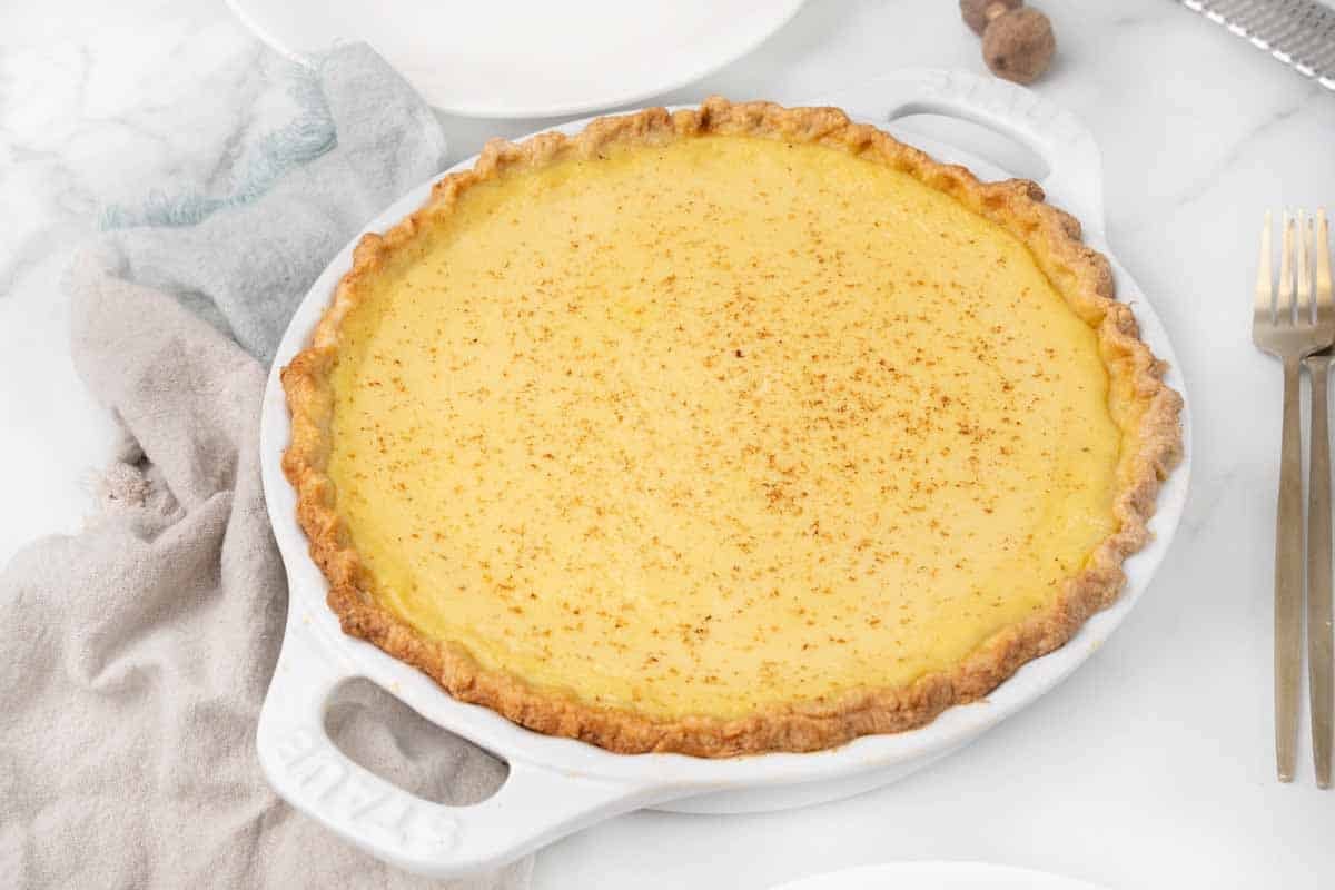 Egg Custard Pie in white pie dish.