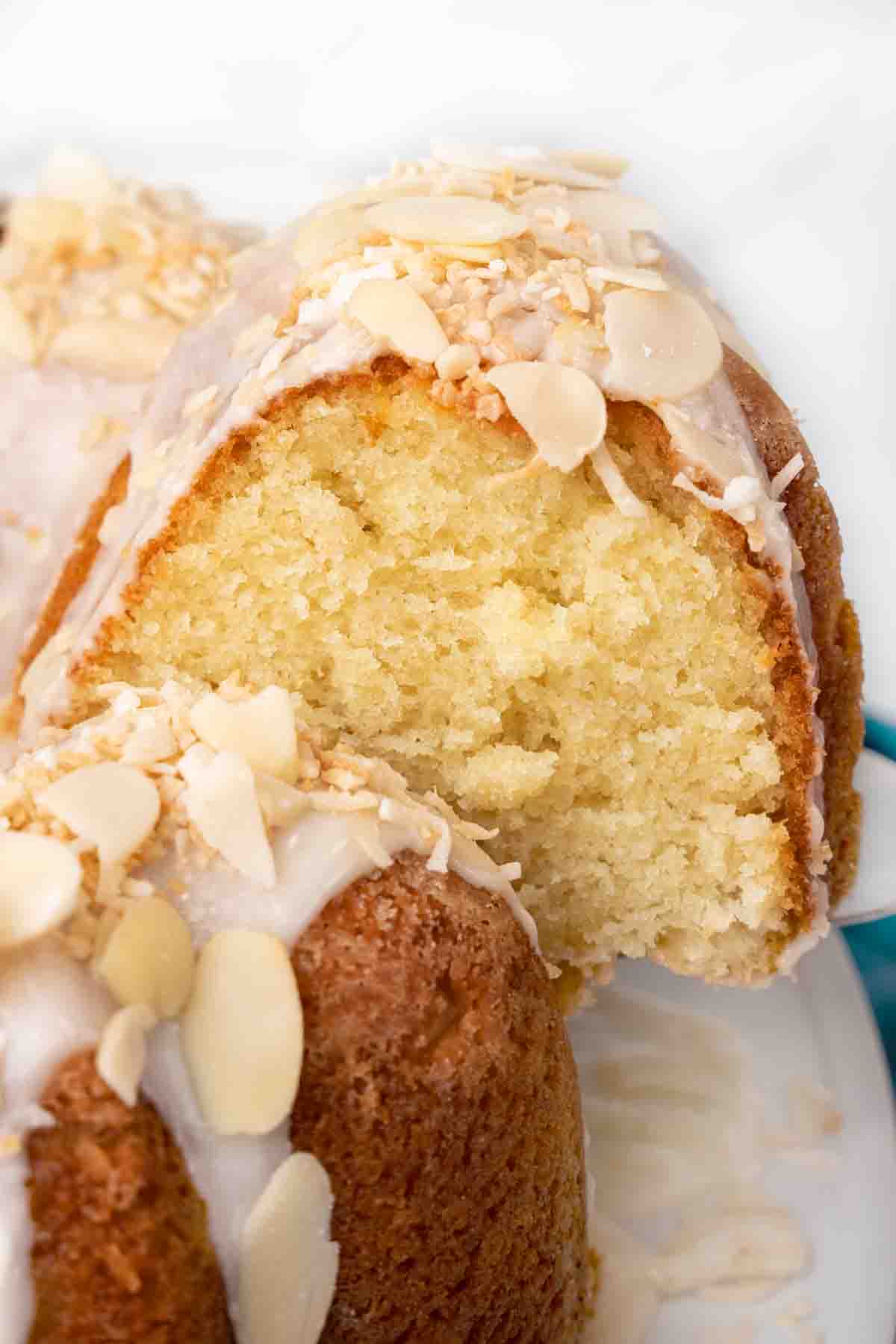 Slice being taken out of Louisiana crunch cake.