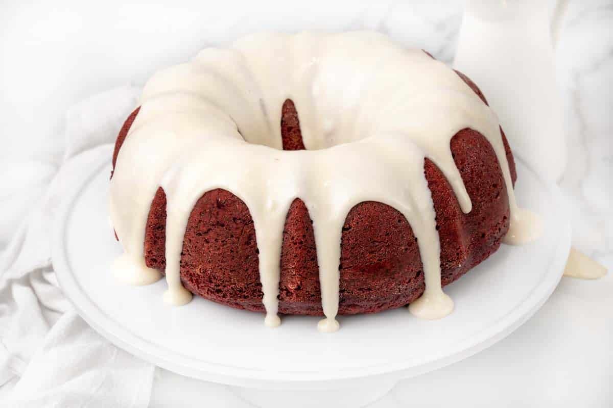 whole red velvet cake with icing.