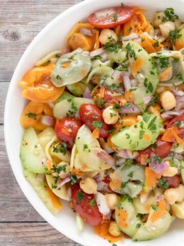 Tortellini Pasta Salad in a white bowl.