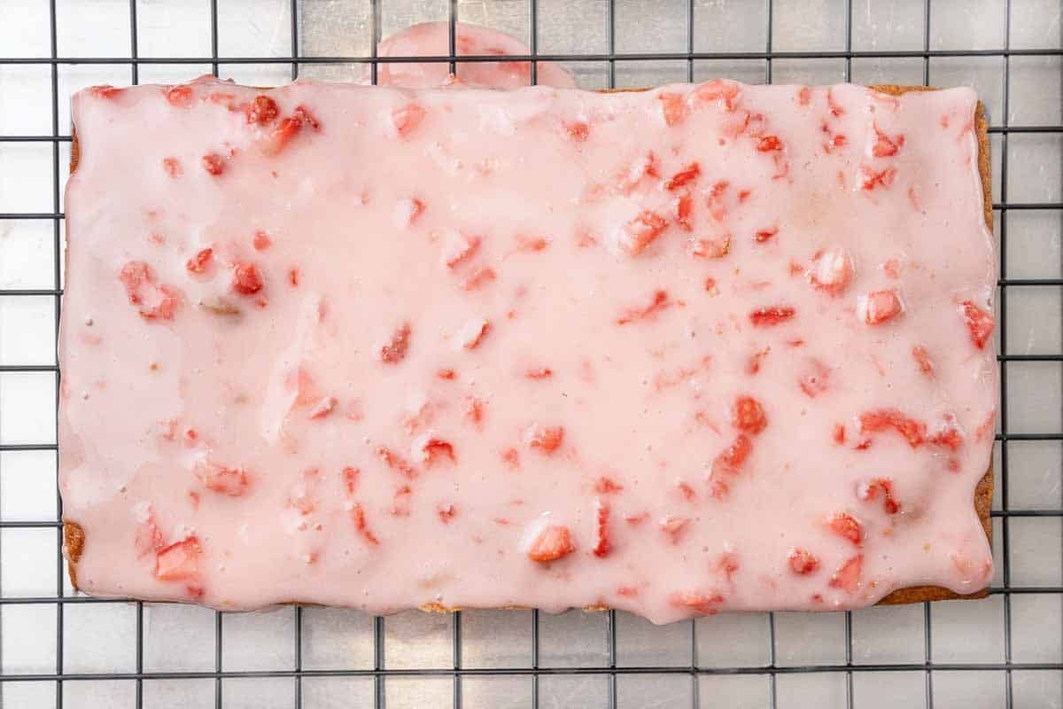 Strawberry bread on a wire rack.