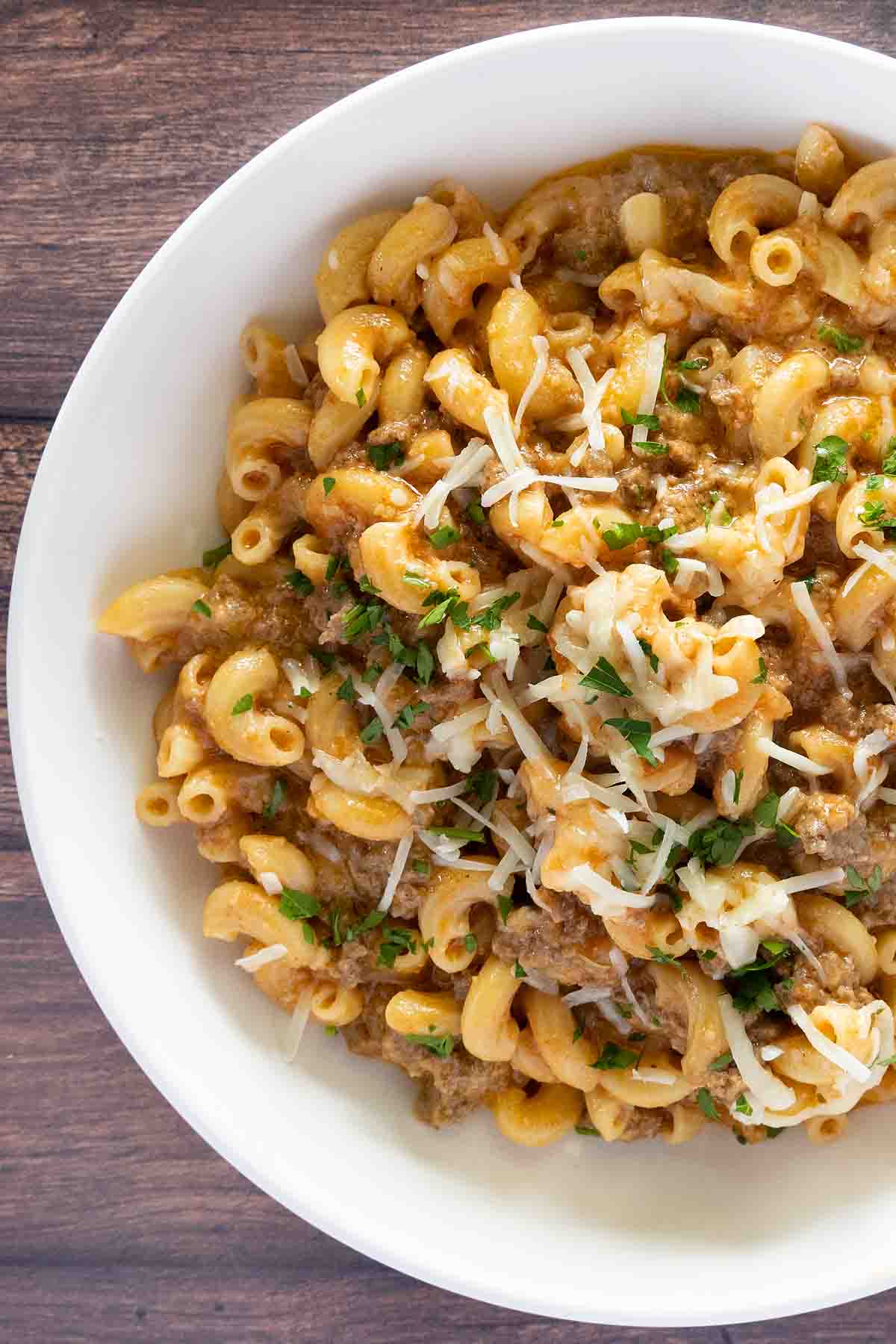 Homemade beefaroni in a white bowl.