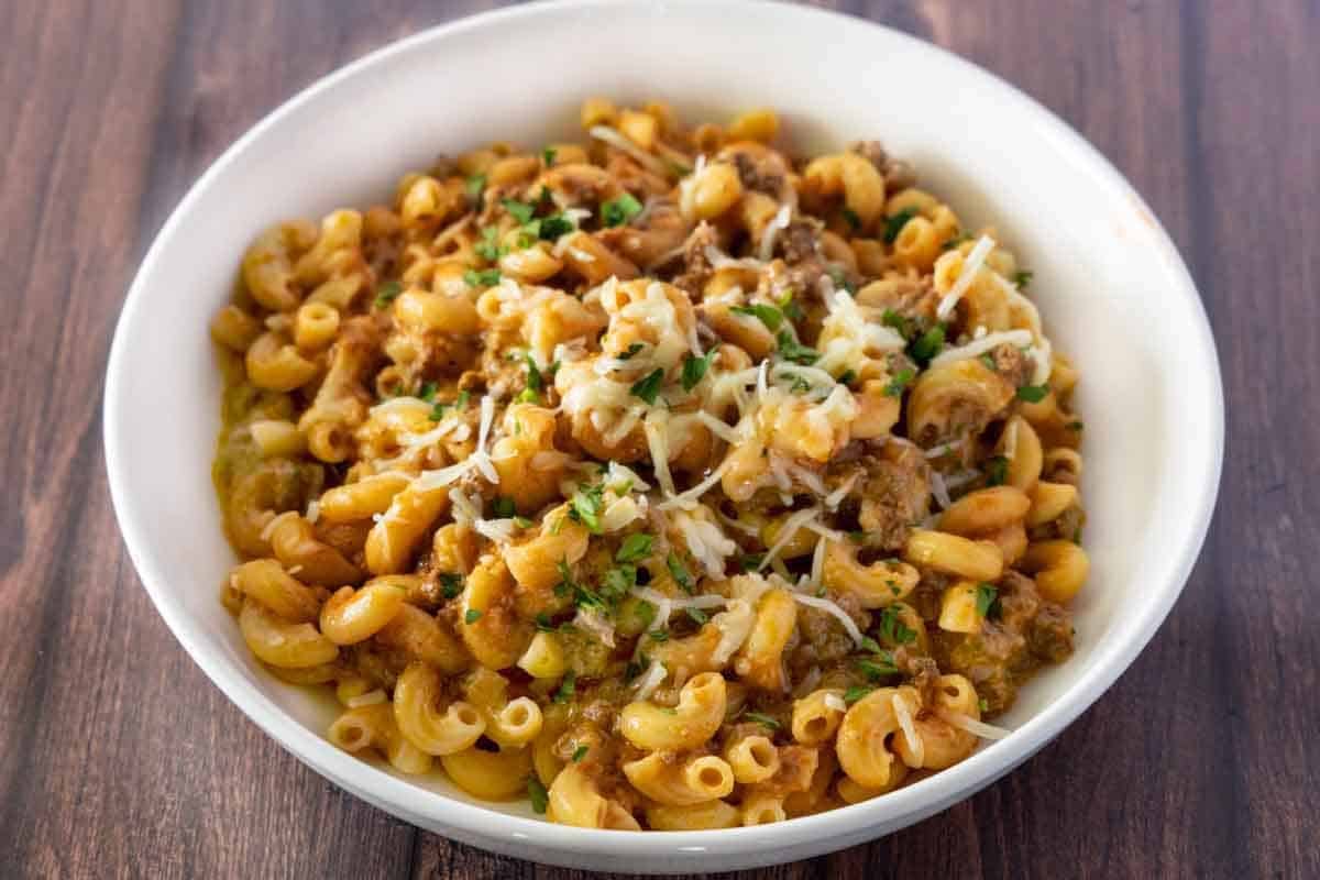 Homemade beefaroni in a white bowl.