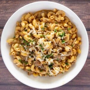 Homemade beefaroni in a white bowl.