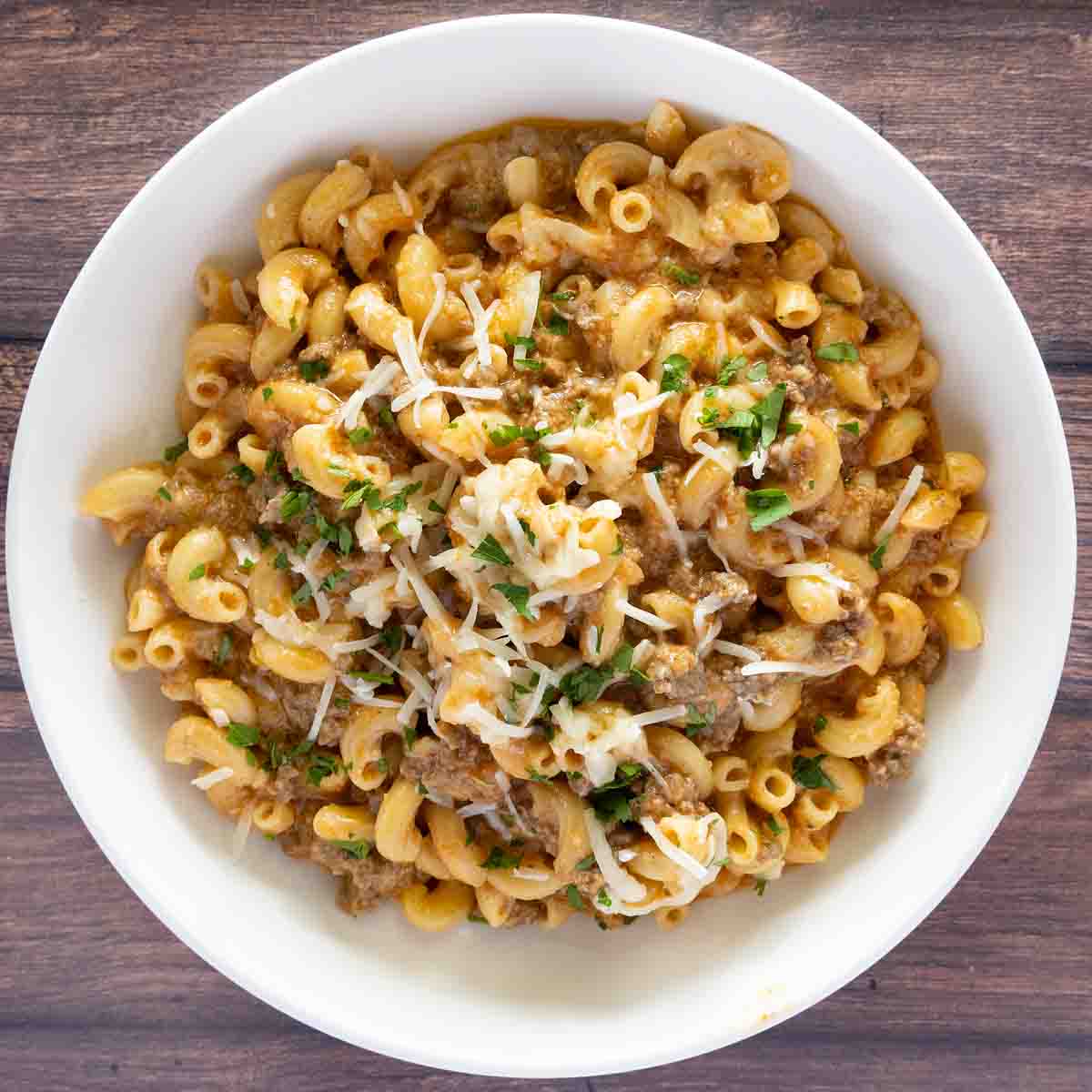 Homemade beefaroni in a white bowl.