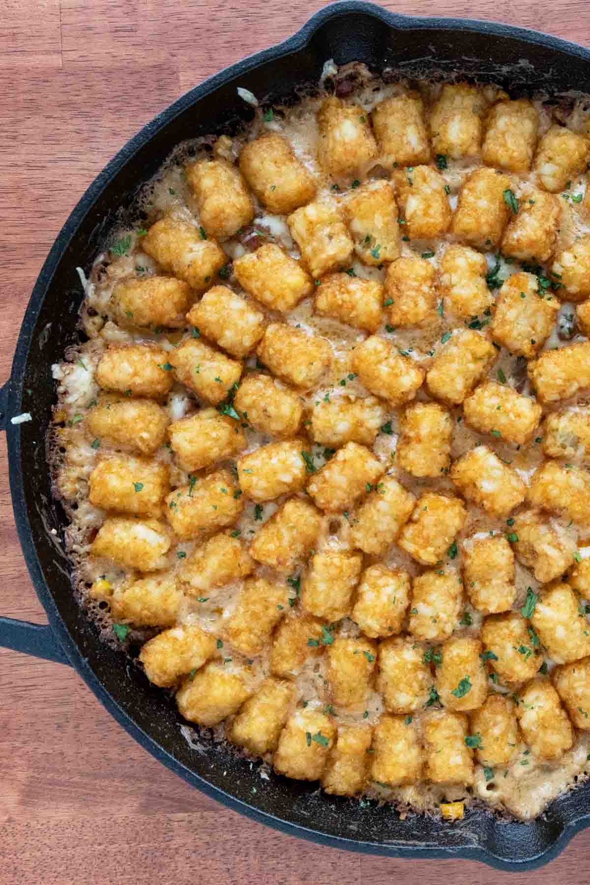 Cowboy casserole in a cast-iron pan.