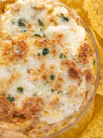 Mexican street corn dip in a glass bowl.