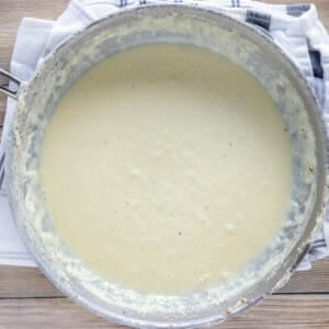 Easy Alfredo sauce in a saute pan.