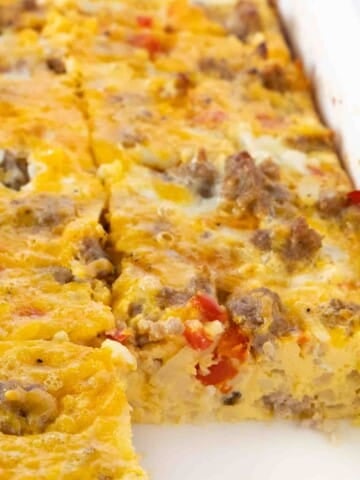 Whole breakfast casserole sliced in the casserole dish.