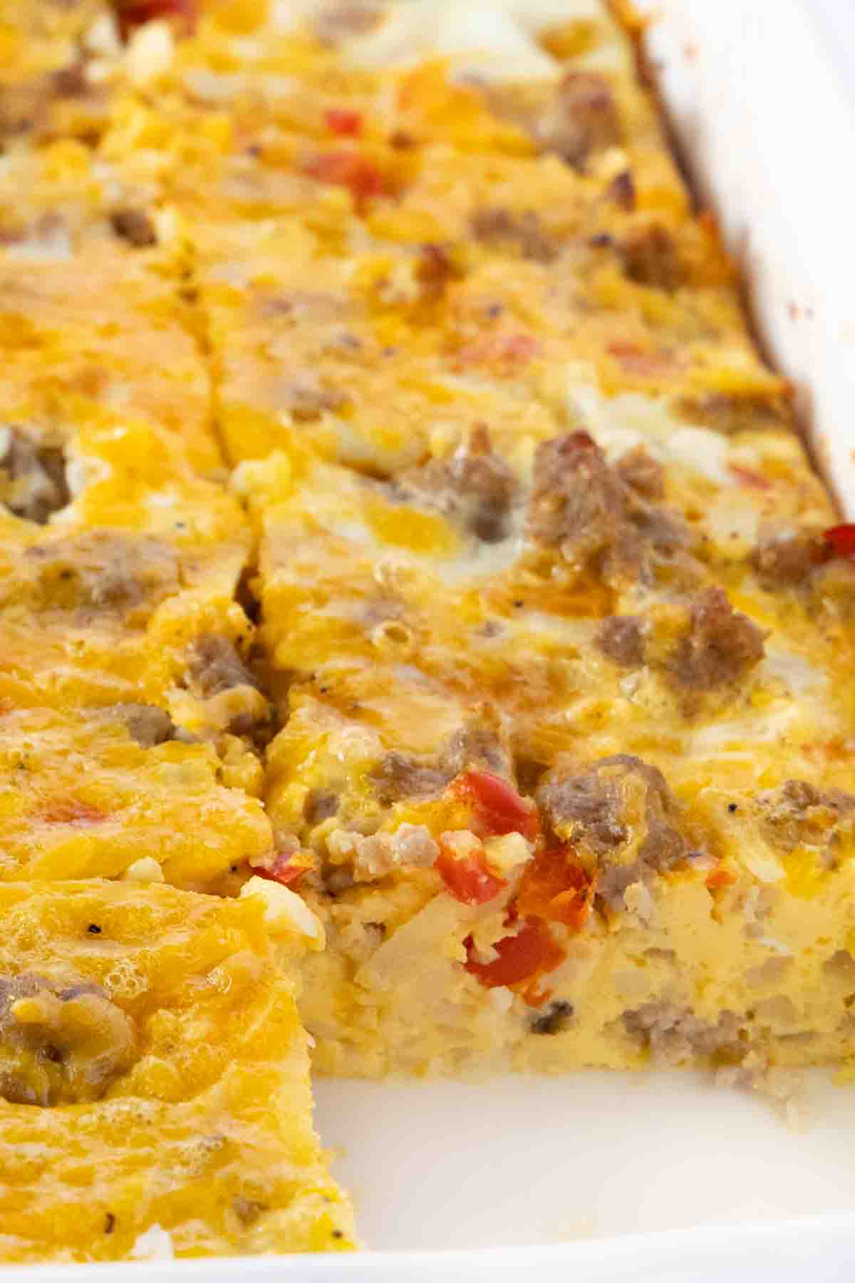 Whole breakfast casserole sliced in the casserole dish.