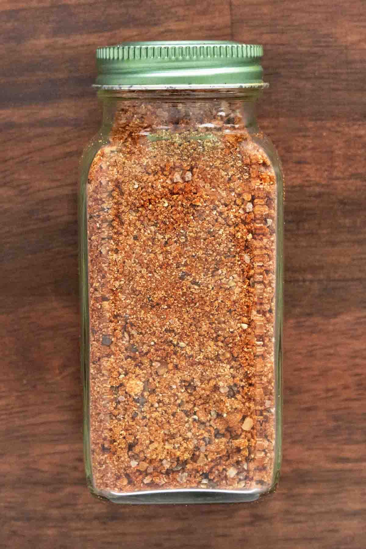 Chicken wing dry rub in a glass jar.