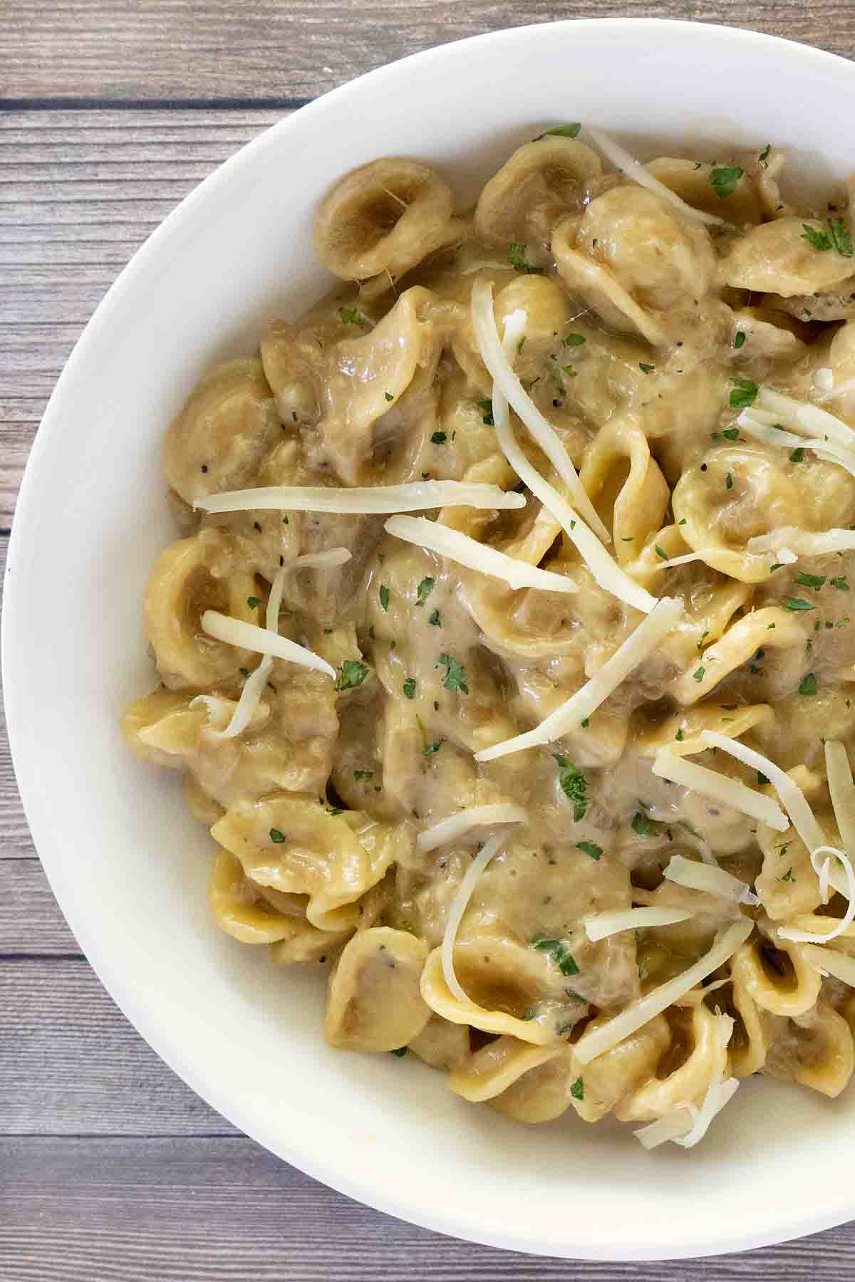 French Onion Pasta in a white bowl.