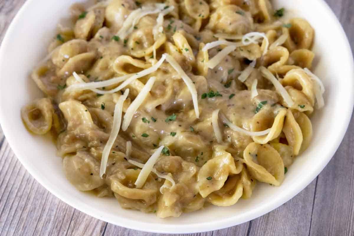 French Onion Pasta in a white bowl.