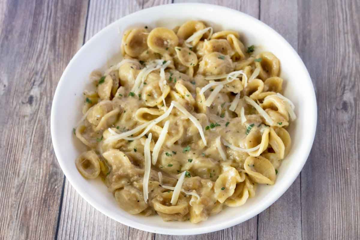 French Onion Pasta in a white bowl.