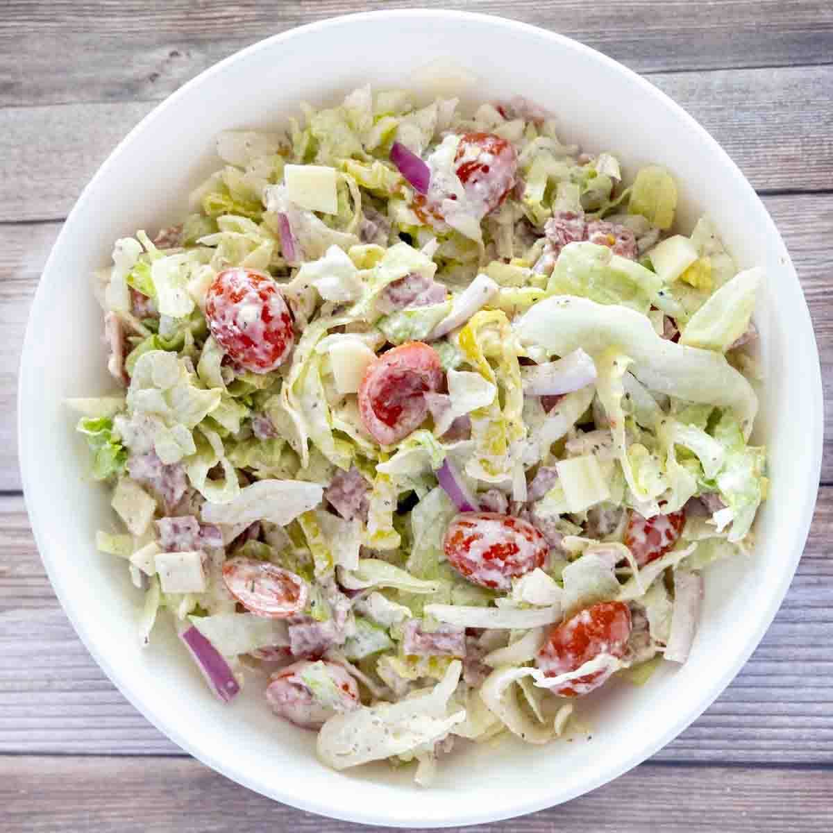 Grinder Salad in a white bowl.