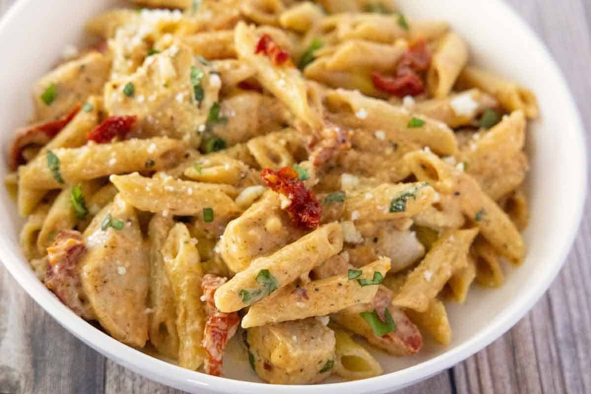 Marry me chicken pasta in a white bowl.