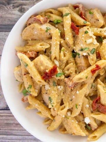 Marry me chicken pasta in a white bowl.