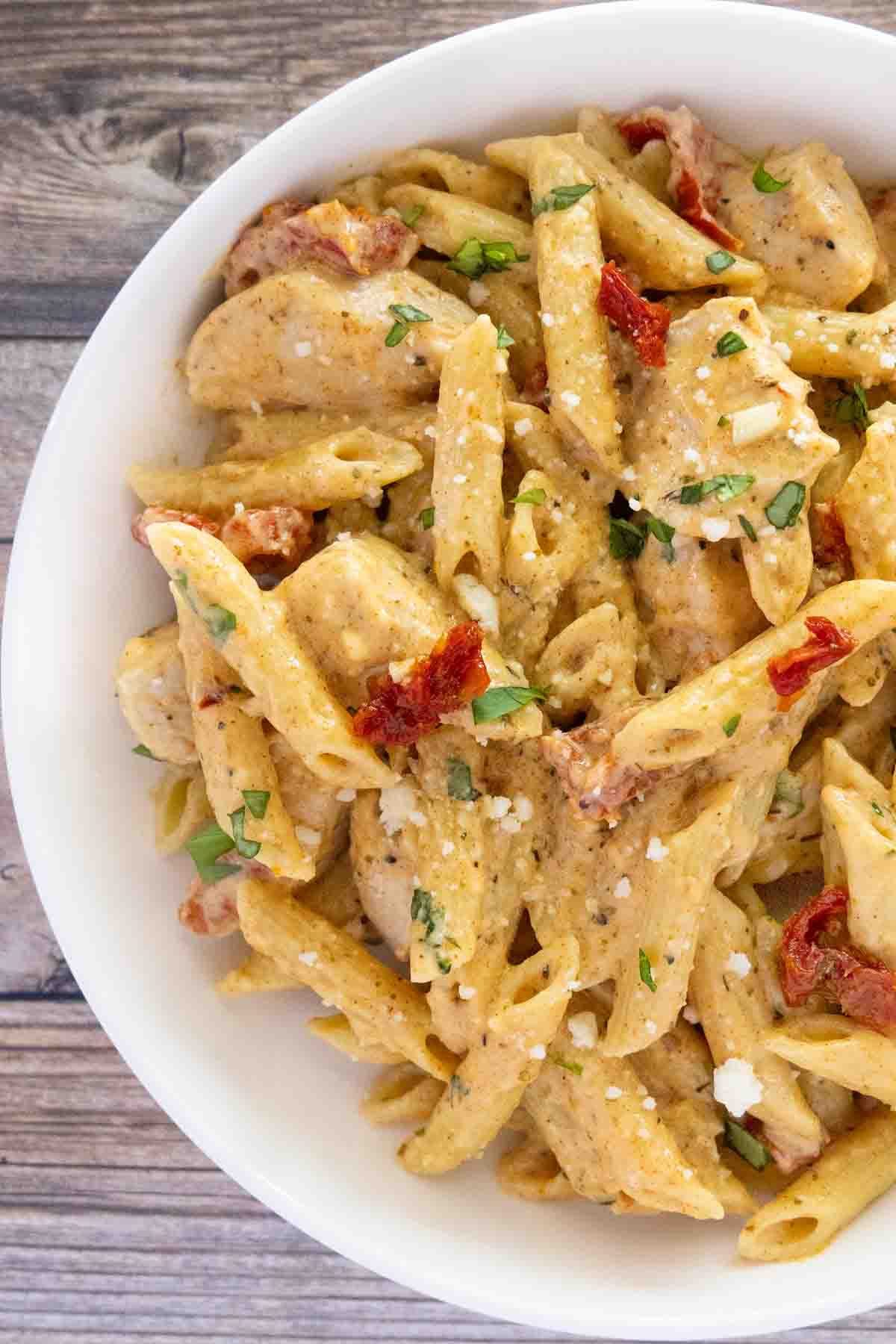 Marry me chicken pasta in a white bowl.