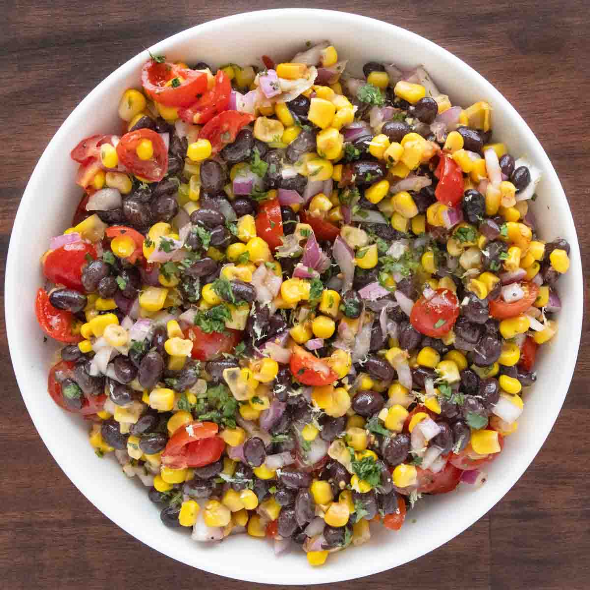 Black Bean and Corn Salsa Dip in a white bowl.