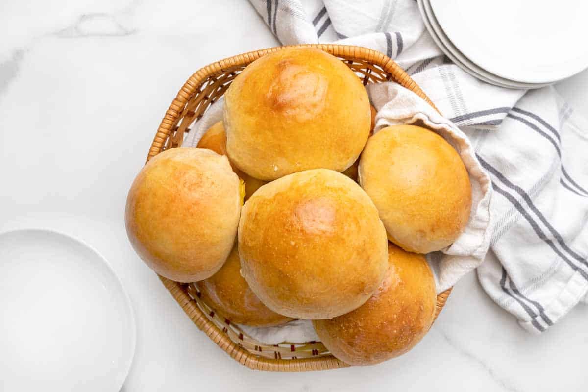 Brioche buns in a basket.