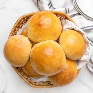 Brioche buns in a basket.