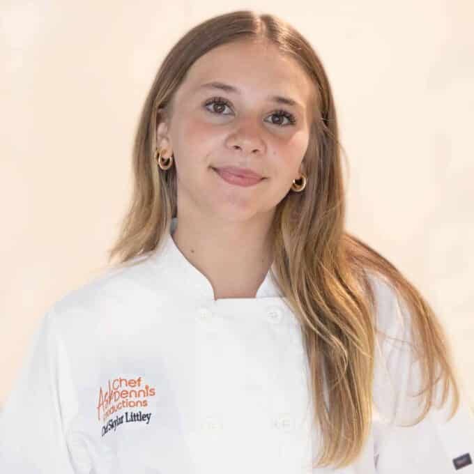 Chef Skylar Littley in a white chef coat.