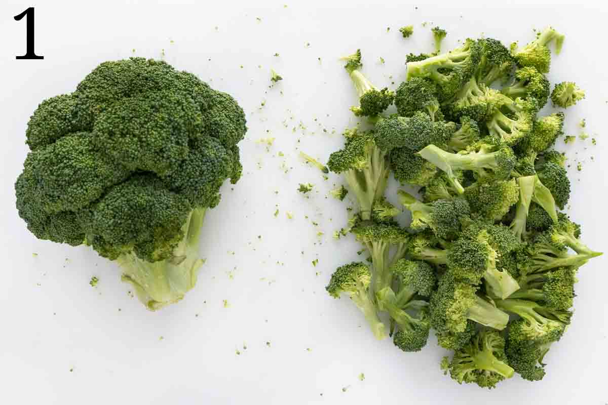 Broccoli on a cutting board.