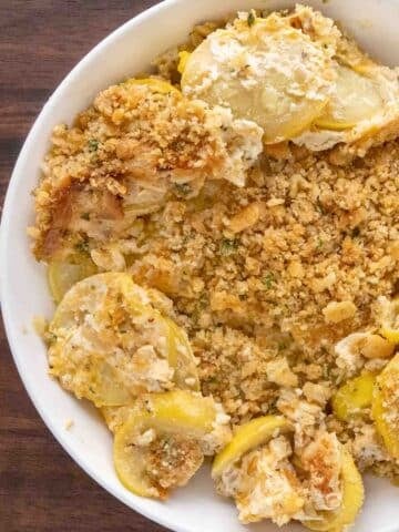 Squash casserole in a white bowl.