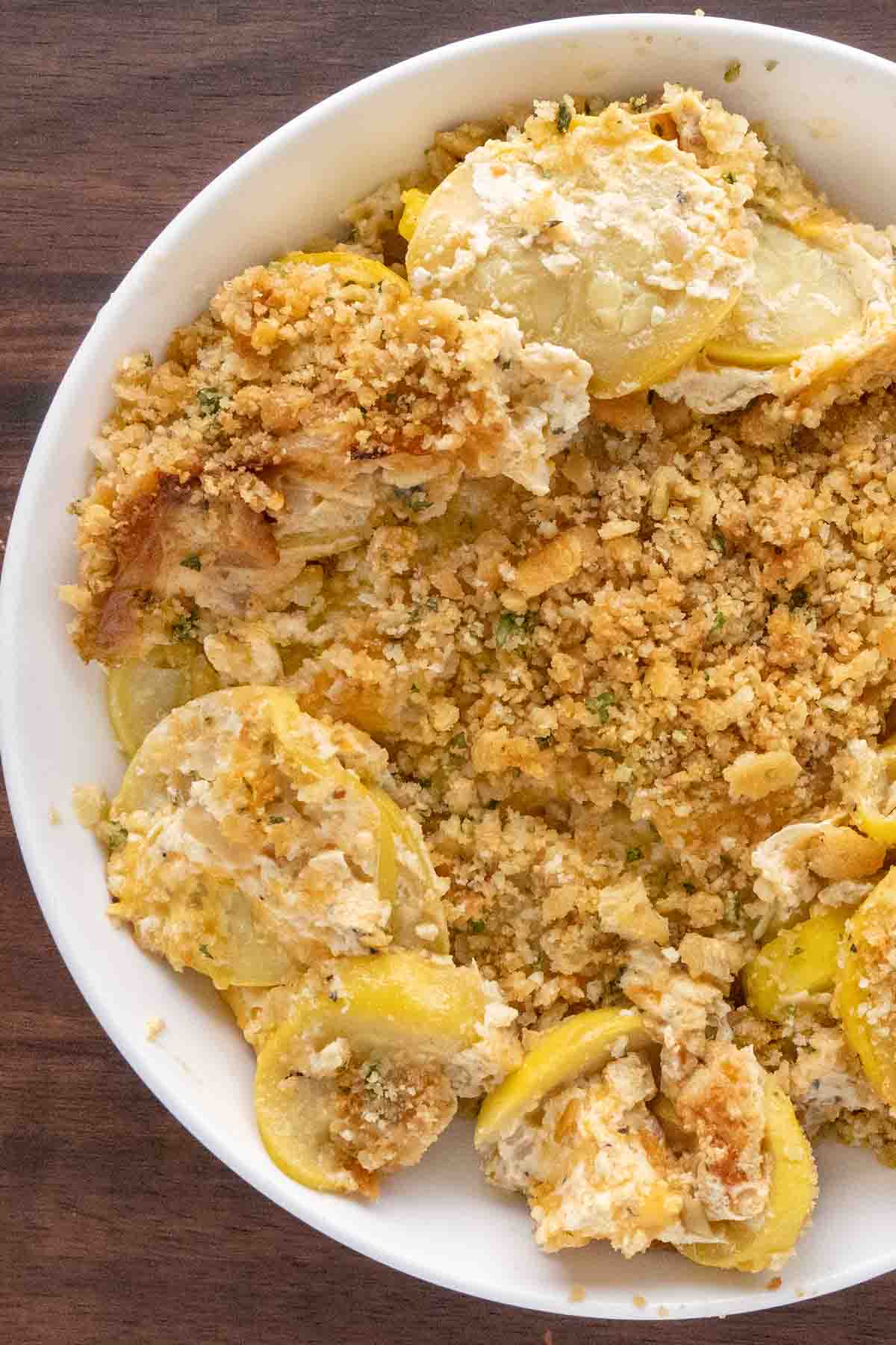 Squash casserole in a white bowl.