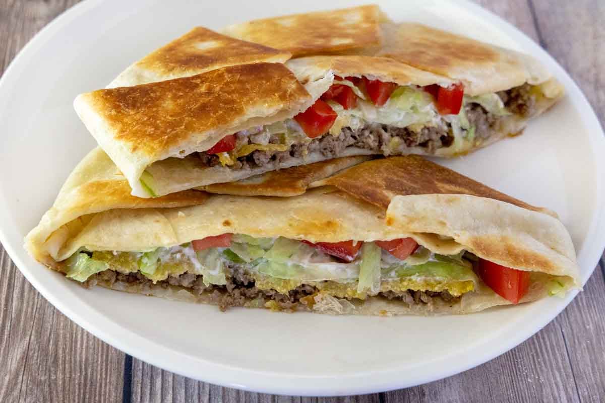 The finished recipe cut in half and served on a white plate. 