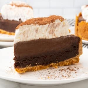 Slice of Mississippi mud pie on a white plate.