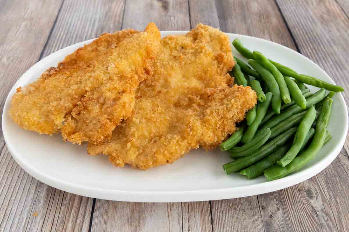 Panko Chicken on a white platter.