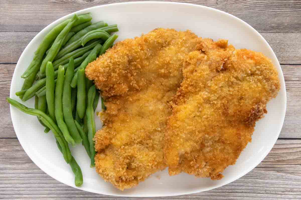 Panko Chicken on a white platter.