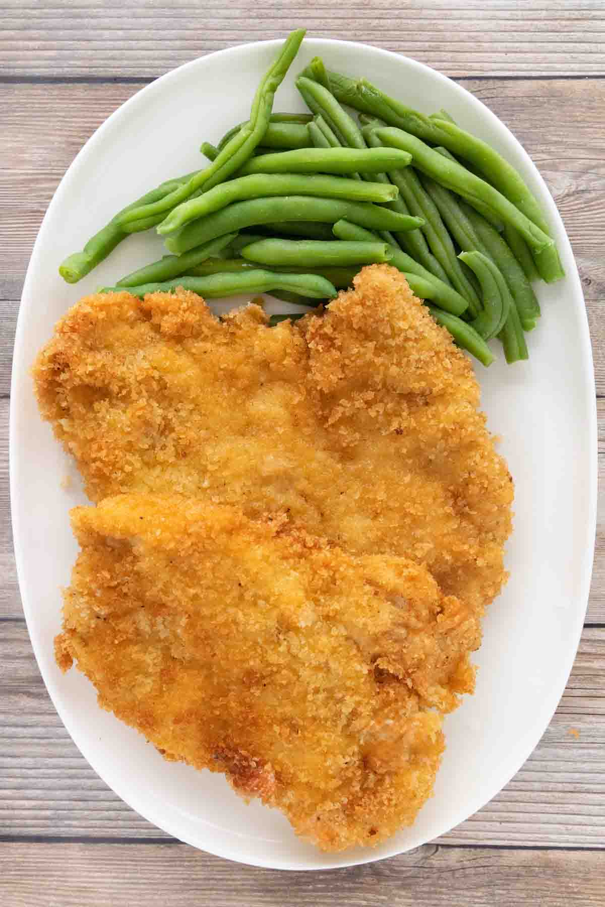 Panko Chicken on a white platter.