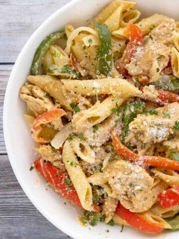 Chicken Fajita pasta in a white bowl.