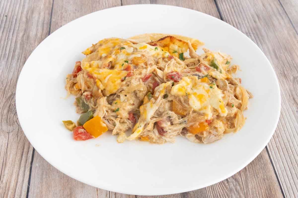 Portion of King Ranch Casserole on a white plate.